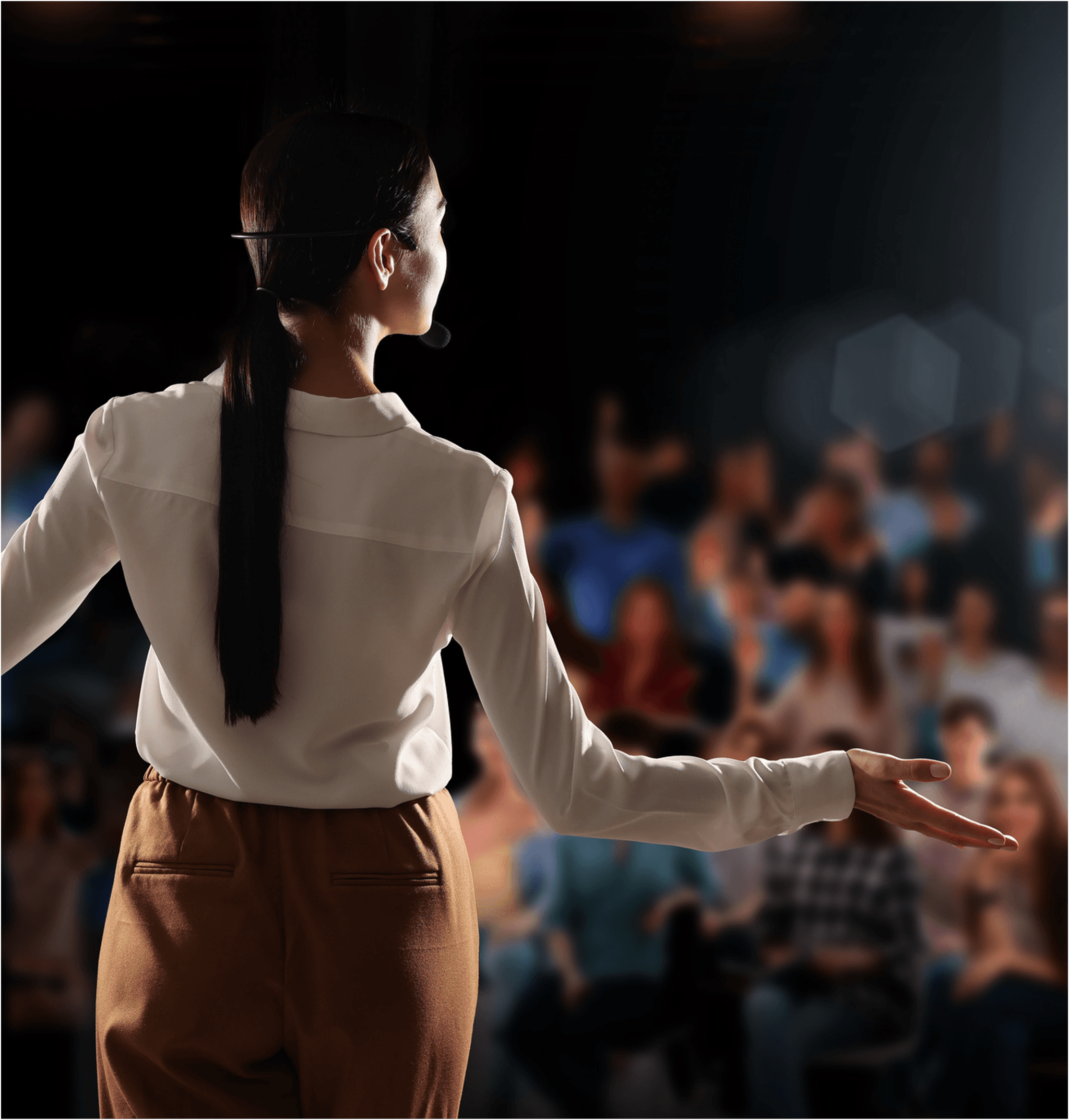 Professional woman presenting to audience
